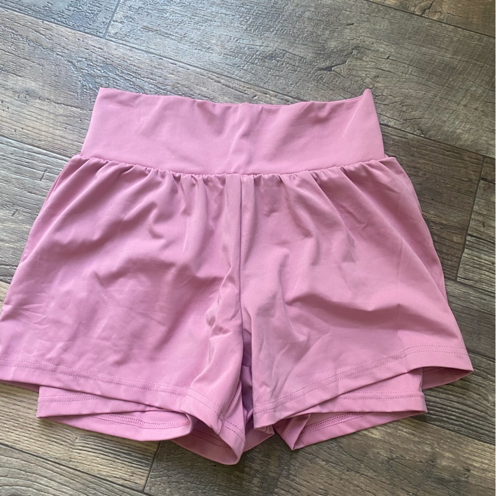 LulaRoe unbeatable workout shorts with built in biker style shorts.